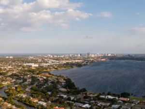 Medley, FL: Fianzas (bail bonds) sign against a clear blue sky.