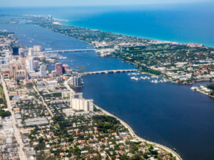 Medley, FL: Fianzas (bail bonds) sign against a clear blue sky.